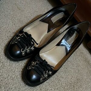 Michael Kors lace up pumps.